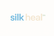 it has the word silk in this color (#6CB4EE) and this font rounded sans serif and have the word heal next to it in the same font and in this color (#F5E6D3) and the text tm in a smaller font and in this color #77C59B)